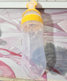 Baby Spoon Bottle Feeder (Color: yellow)